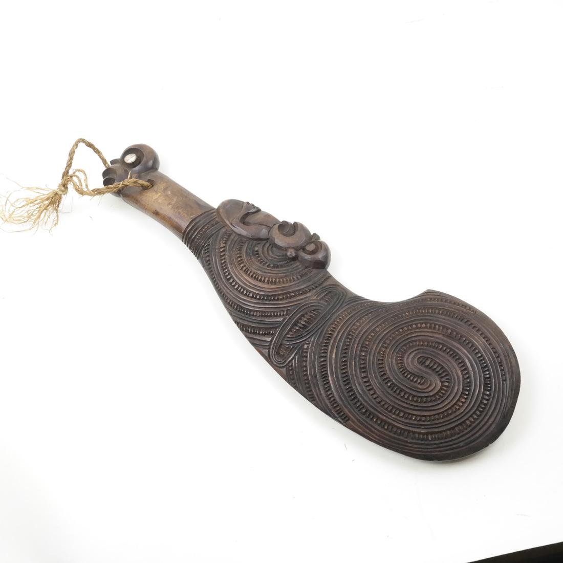 Maori Carved Wood Club: Maori carved figural club. Dimensions: 15.5" L ; 