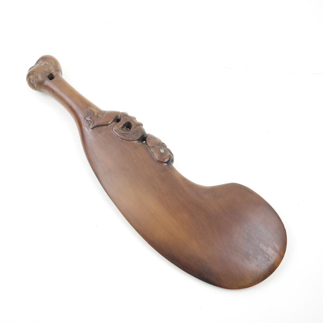 Maori Carved Wood Club: Maori carved figural club. Dimensions: 15.5" L ; 