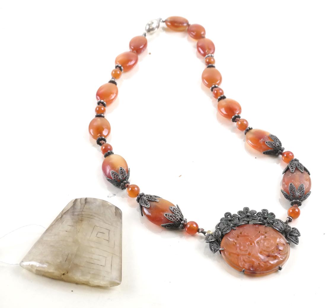 1920s Carve Carnelian Necklace; Chinese Jade: Comprises a 1920s carved carnelian and sterling silver necklace, together with Chinese jade.