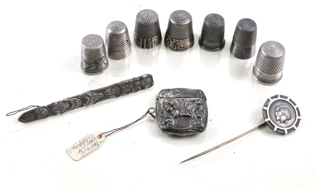 Collection of Small Sterling Items: Including totem pin, Roman stick pin, thimbles, small match safes, more.