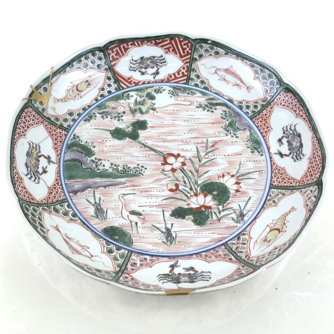 19th Century Kutani Charger: 19th century Edo period Kutani charger. Dimensions: 12" H x 2" W; 12" ⌀ x 2" H; 