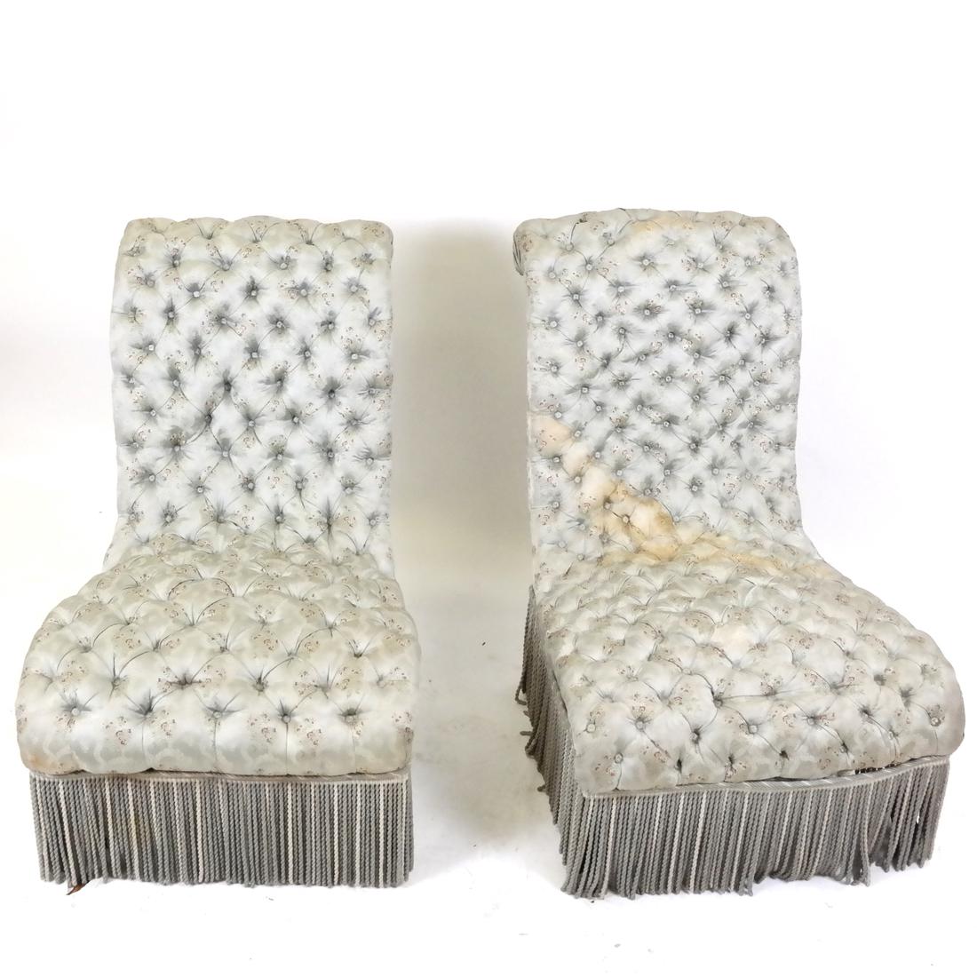 Pair of Exotic Slipper Chairs: Pair of exotic slipper chairs with fringe, tufted upholstery and scrolling backrest.