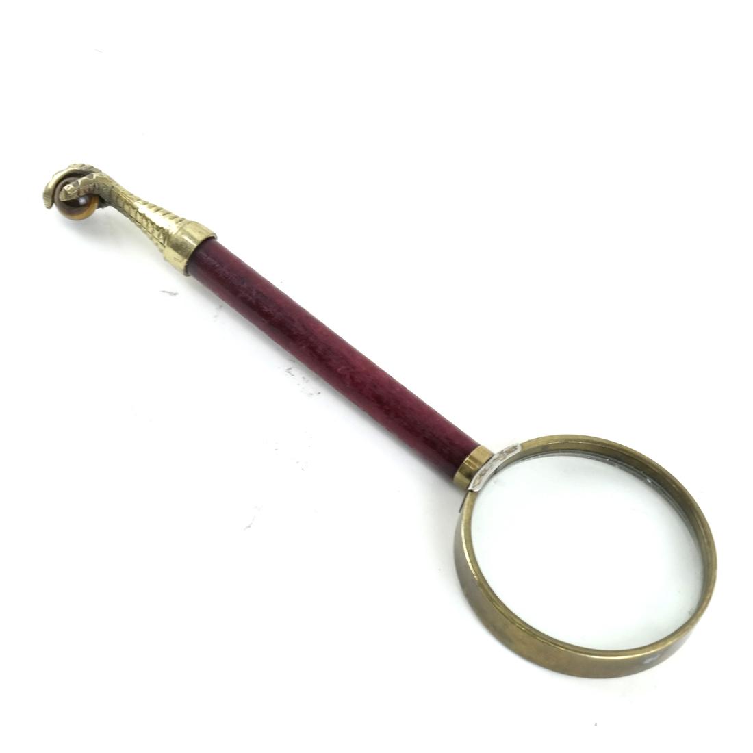Bird Claw-Form Magnifying Glass: Bird claw-form magnifying glass. Dimensions: 10" H x 3" W; 