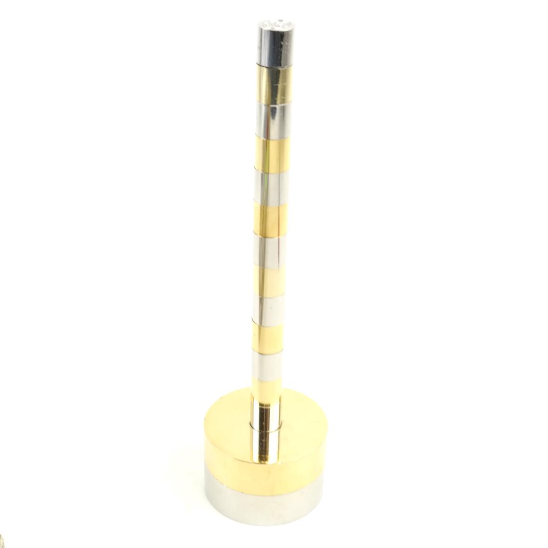 Mixed Metal Pen and Pen Holder by Gucci: Gucci mixed metal pen and pen holder. Dimensions: 1.5" H x 1" W; 