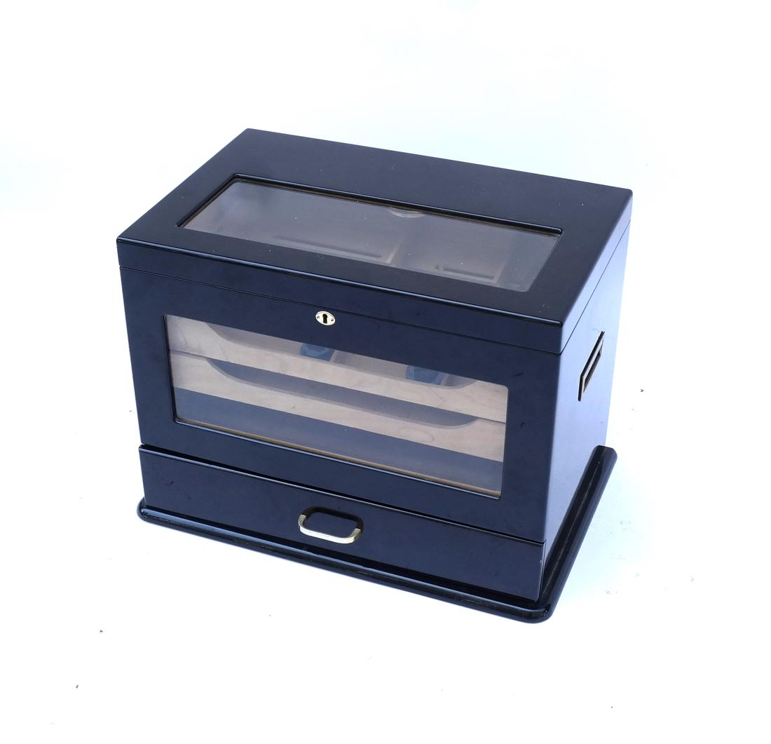 Polished Mahogany Humidor: Hinged top humidor with locking bottom drawer (key present). Bears two removable trays. Features beveled glass panes at top and front.