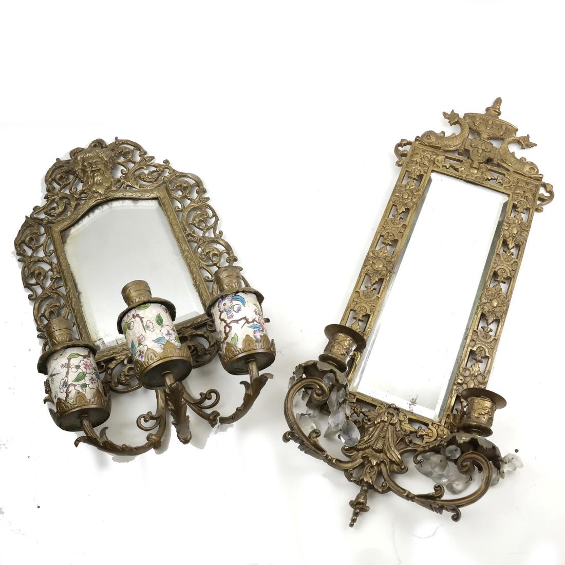 Two Allegorical Sconces, in the Manner of Caldwell: Comprises: 1.) Sconce with north wind design and pair of candleholders. 2.) Sconce with dolphin-form design. Each having beveled mirror. [9 to 10 L x 17 to 23 H].