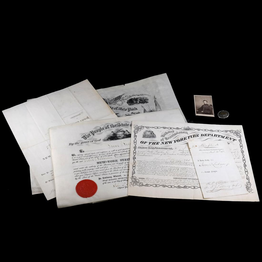 BREVET-COLONEL ISSAC LOCKMAN'S WAR COMMISSIONS & OTHERS: 6 partly-printed 4to to folio size war-date commissions and other documents following Isaac P. Lockman's career in the New York State Militia from 1861 to 1866 accompanied by a C.D.V. of Lockman in un