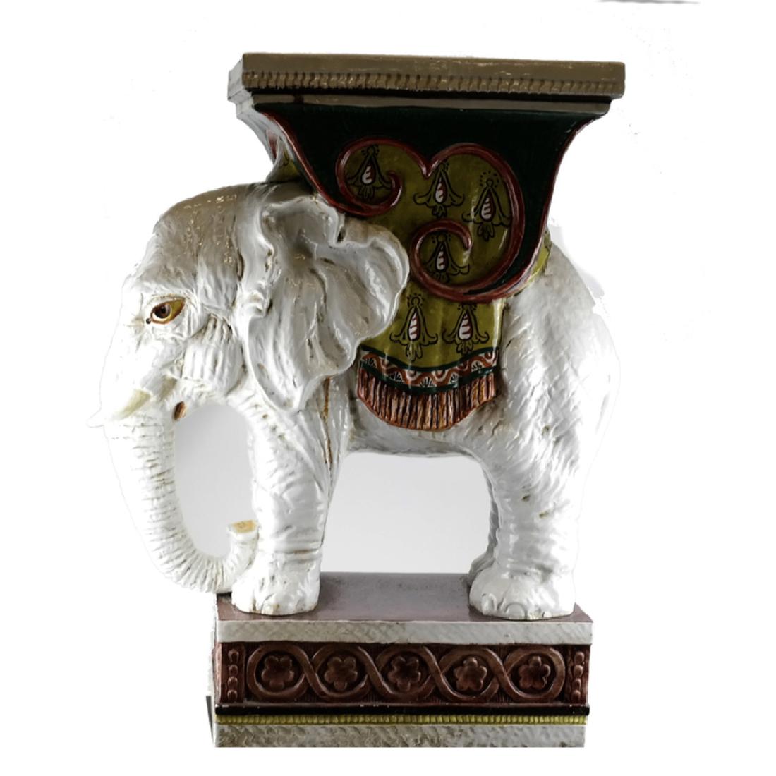Decorated Porcelain Elephant Garden Seat: Decorated porcelain elephant garden seat. Dimensions: 9.5" W x 13" D x 25"H; 