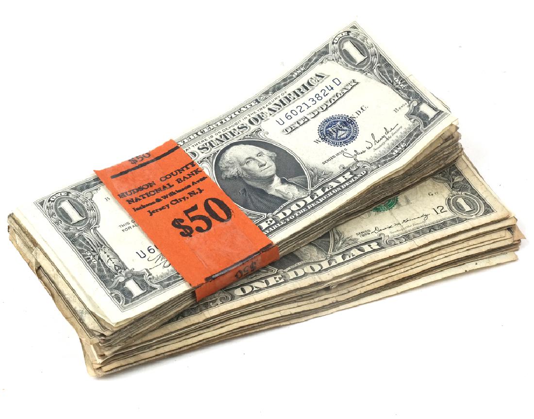 $70 in Currency and Silver Certificates: Includes one $20 note and 50 $1 Silver Certificates.