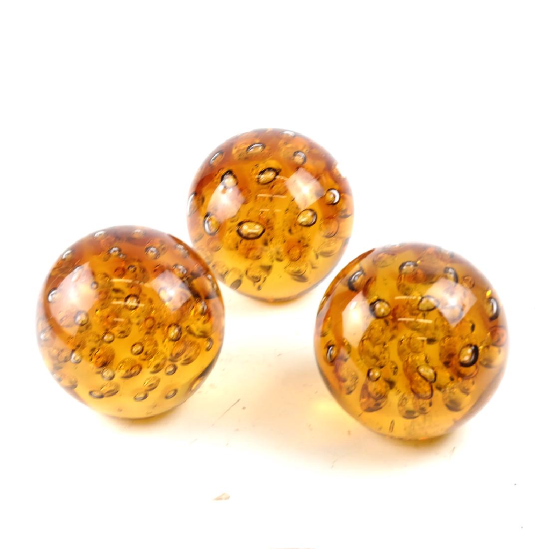 Three Amber Bubble Form Paperweights (1 of 3)