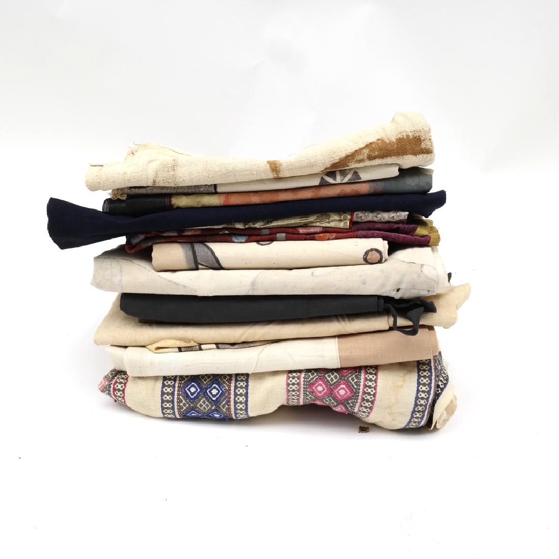 Lot of Indian Linens and Textiles: Assortment of linens, textiles, cottons and silks. Various motifs and colors. Size varies [11" H x 12" W to 34" H x 50" W]. Dimensions: 11" L x 12" W; to 