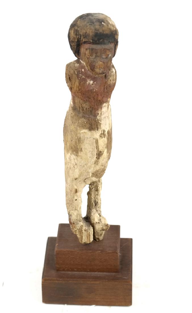 Egyptian Wooden Oarsman Statue: Egyptian carved wood statue, of an oarsman. On stepped wood base. In style of 12th Dynasty. Purchased from Marshall Field & Company, Chicago during the 1970s. Dimensions: Figure - 6.5&