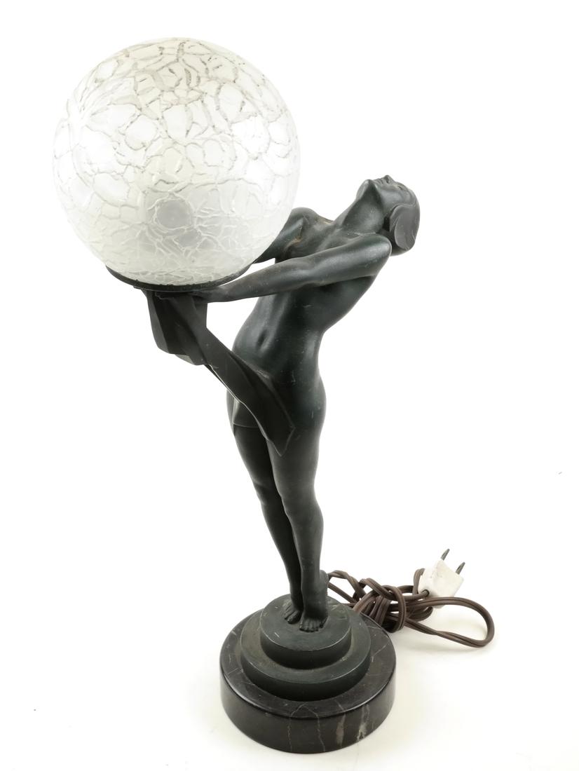 Max Le Verrier, Metal Female Nude Lamp: A green metal figure of a nude female, mounted as a lamp, with crackled glass shade. Signed, by Le Verrier Foundry, Paris. Dimensions: 7.5" W x 3" D x 14.5"