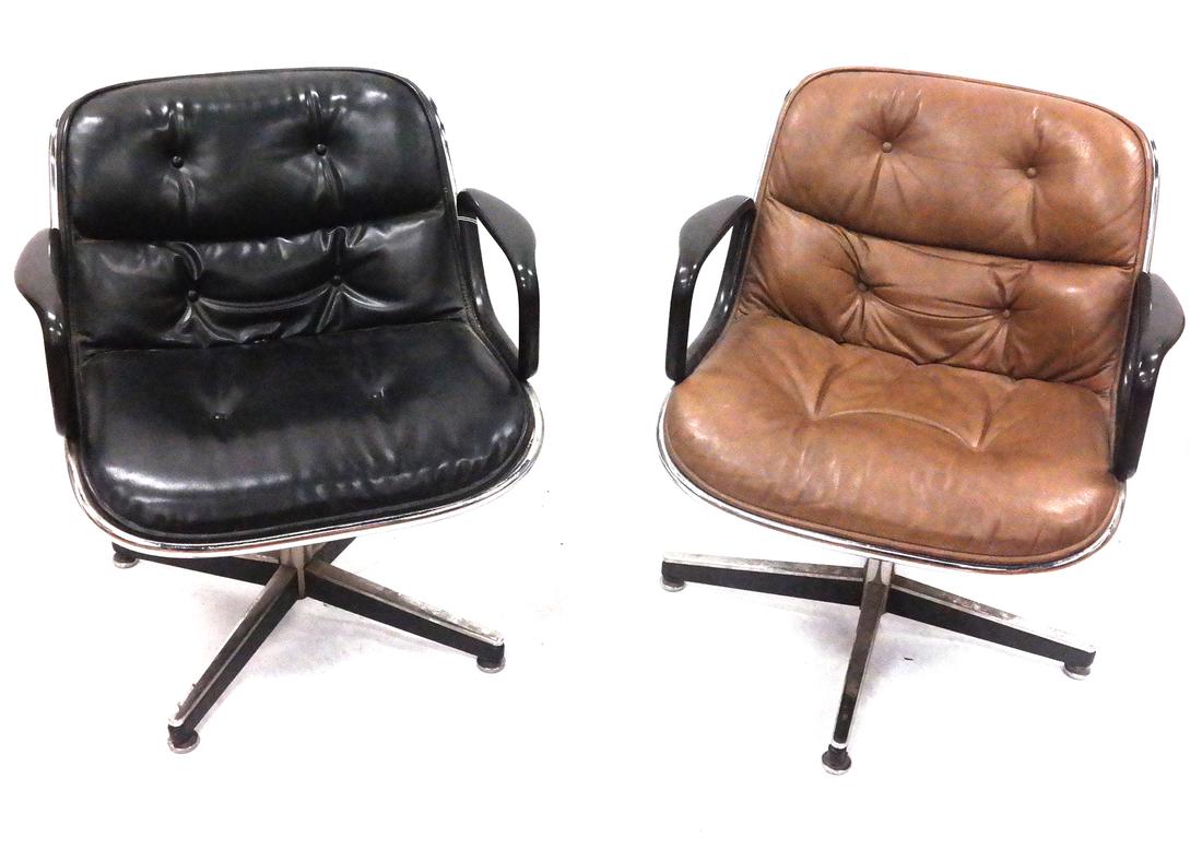Two Knoll Swivel Chairs: Two stainless steel and leather Knoll chairs including a brown and a black example, on pedestal bases.
