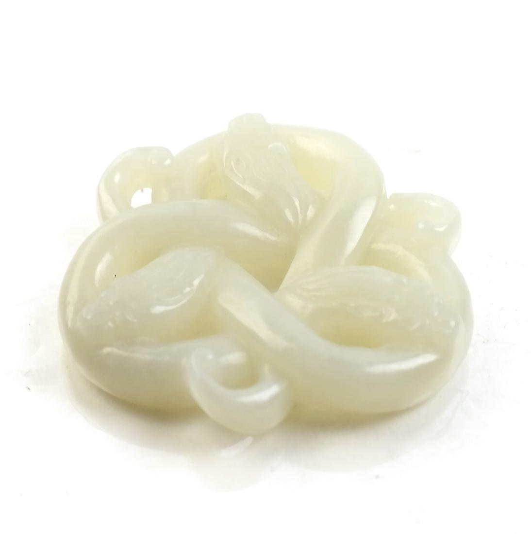 A Chinese Chilong White Jade Plaque (1 of 7)