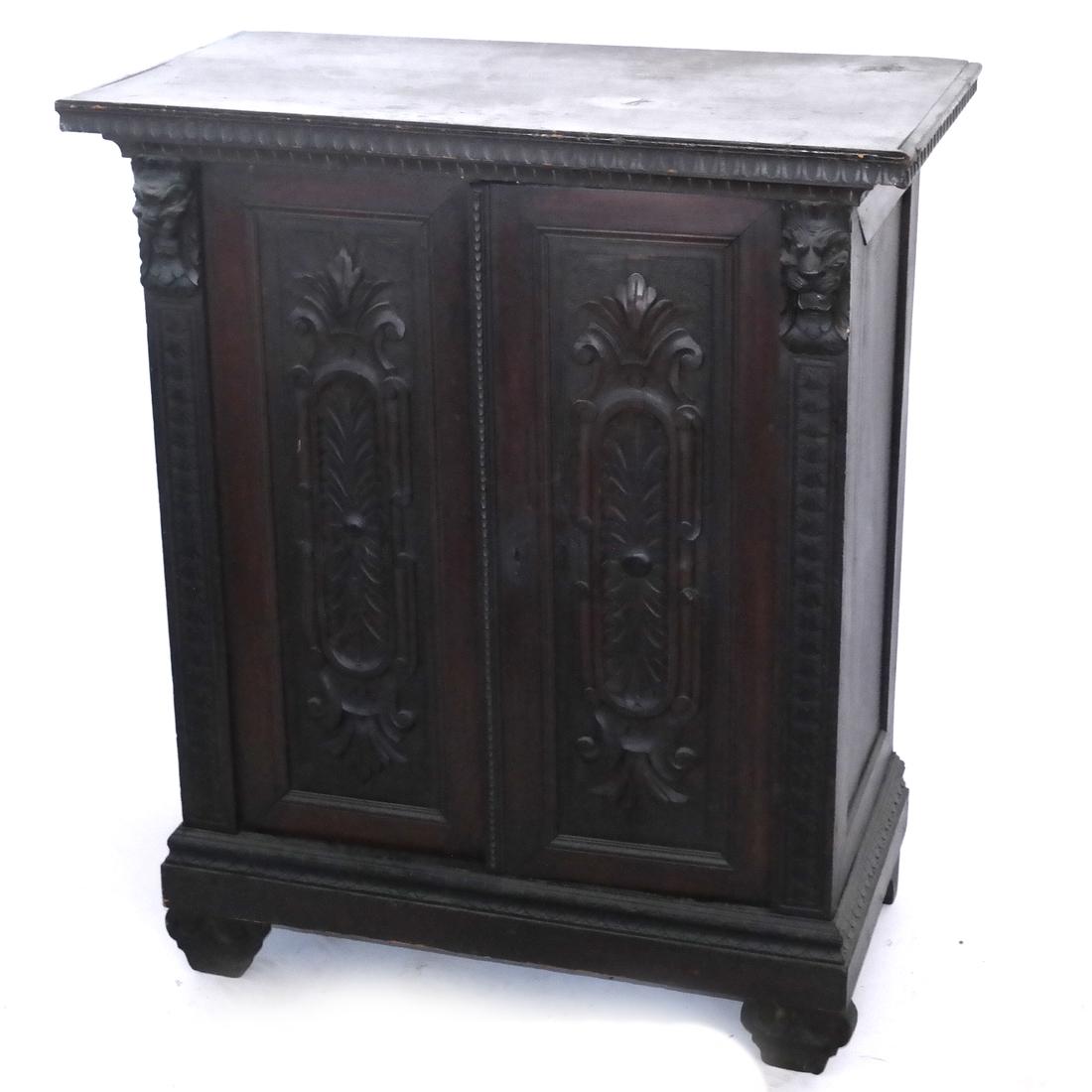 Renaissance-Style Two-Door Server.: With lion appliques. Dimensions: 30" W x 15.5" D x 35.5"H; 