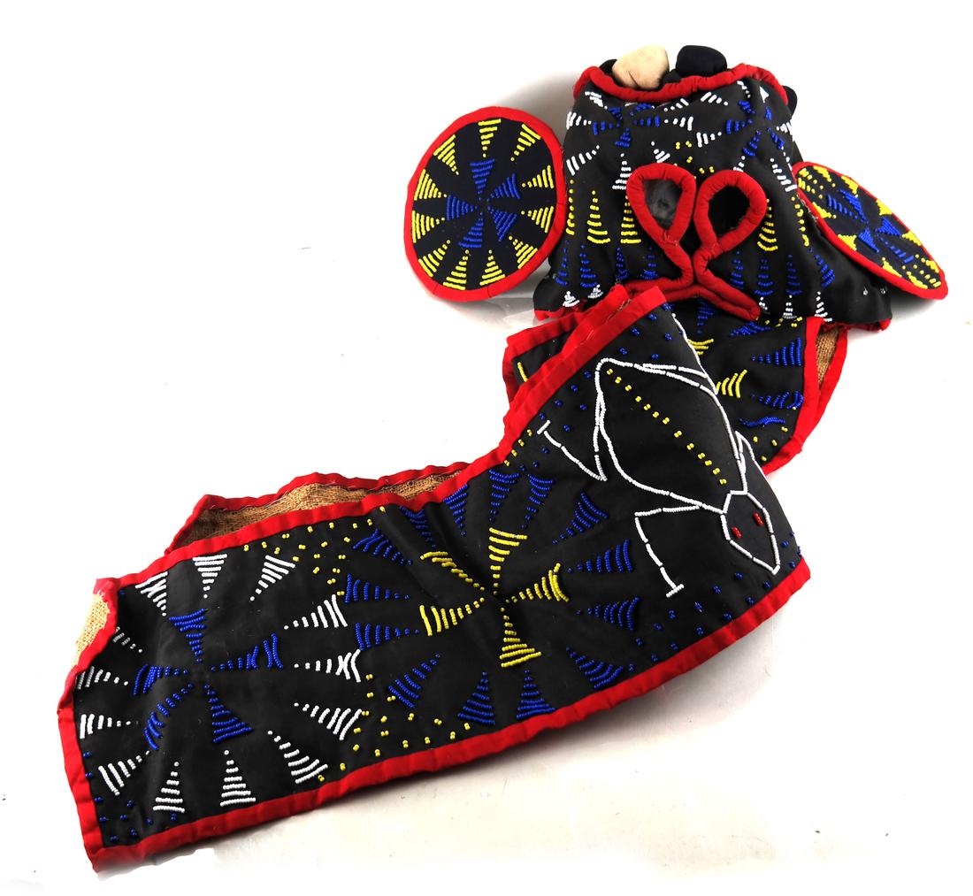 West African Elephant Mask/Headdress: In cotton, glass beads, and burlap. Mid-20th century. Dimensions: 45.5" L ; 