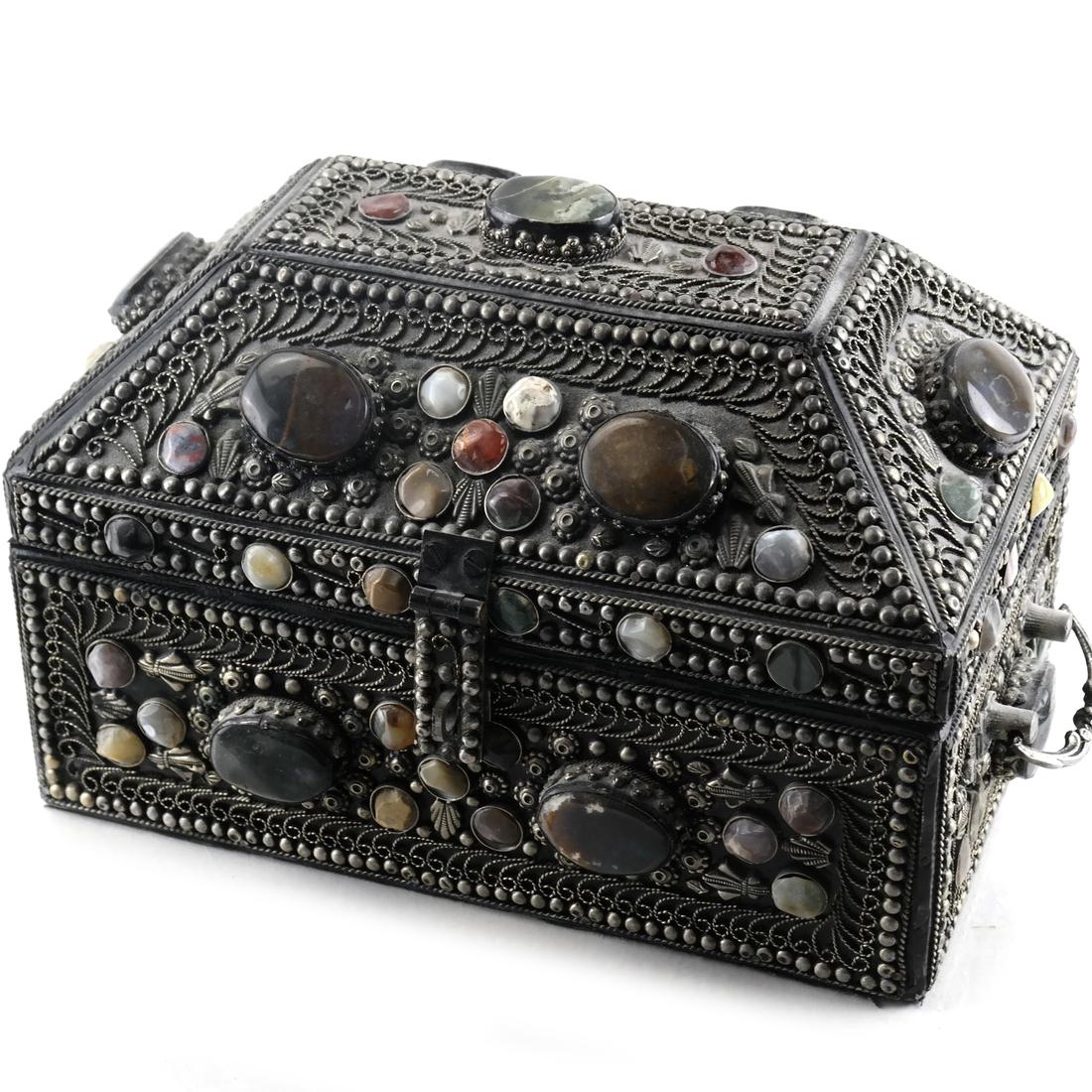 Indian Lined Jewelry Box/Casket: The exterior inset with agates and semi-precious stones. Late 20th century. Dimensions: 11.5" W x 6.25" D x 7.5"H; 