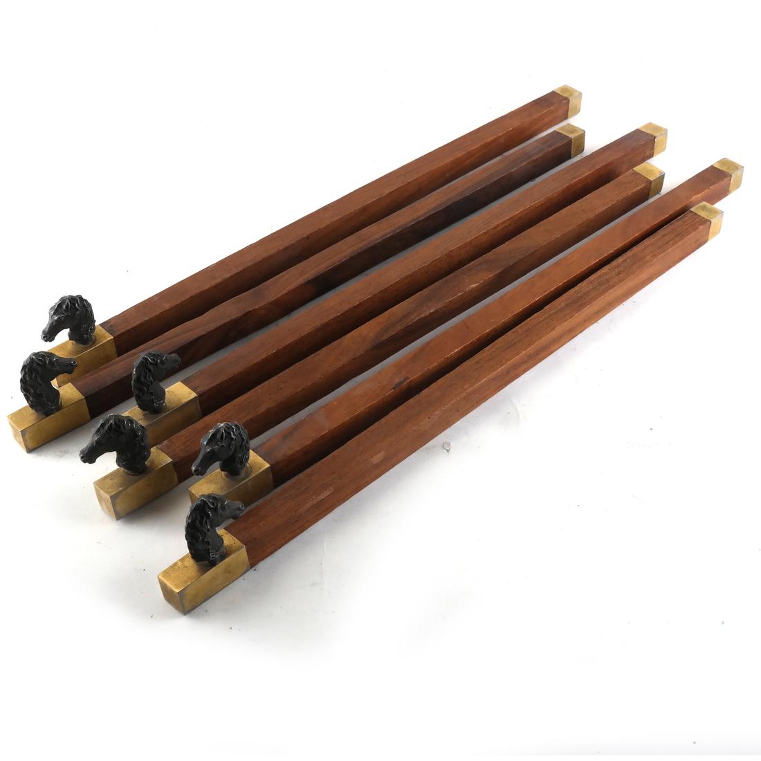 Set of 6 Horse Head Scroll Weights: 6 mahogany and brass horse head scroll weights. [15 1/2 x 3/4 x 3/4 inches].