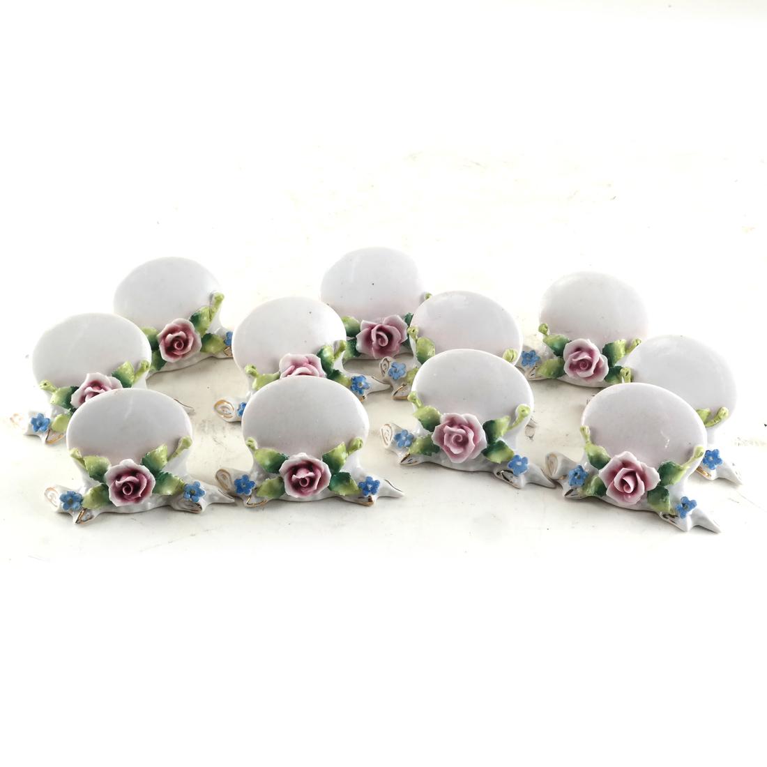 11 German Porcelain Place Card Holders: With floral decorations. [2 x 3 x 1 inches].