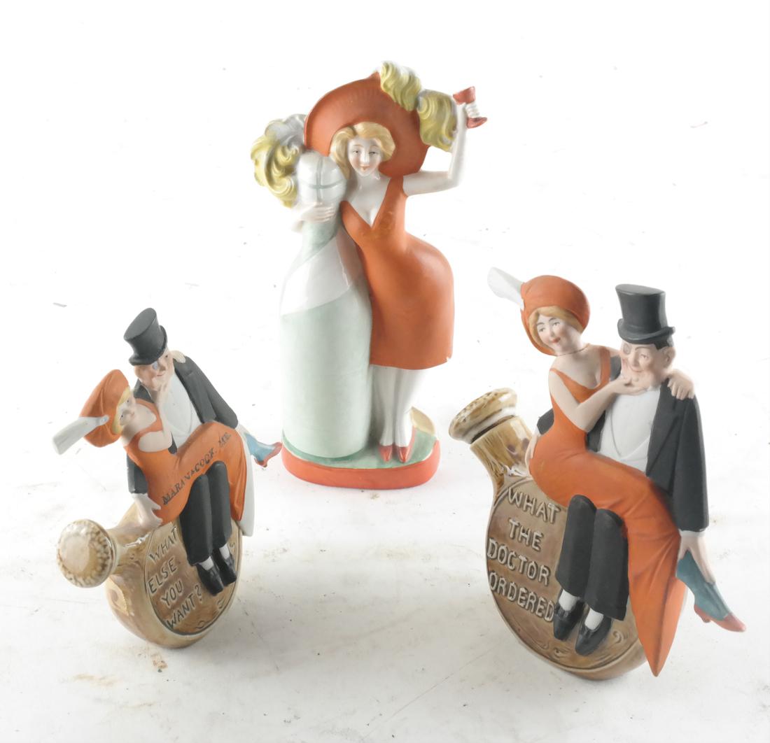 Three Vintage American Figural Flasks, c. 1940: Two figural flasks (with stopper), 1) "What the Doctor Ordered, 2) "What Else Do You Want", and 3) a figural flask (with stopper) of a woman alongside a bottle. All Marana Cook, ME. [4 1/2 x 5 1/2 inc