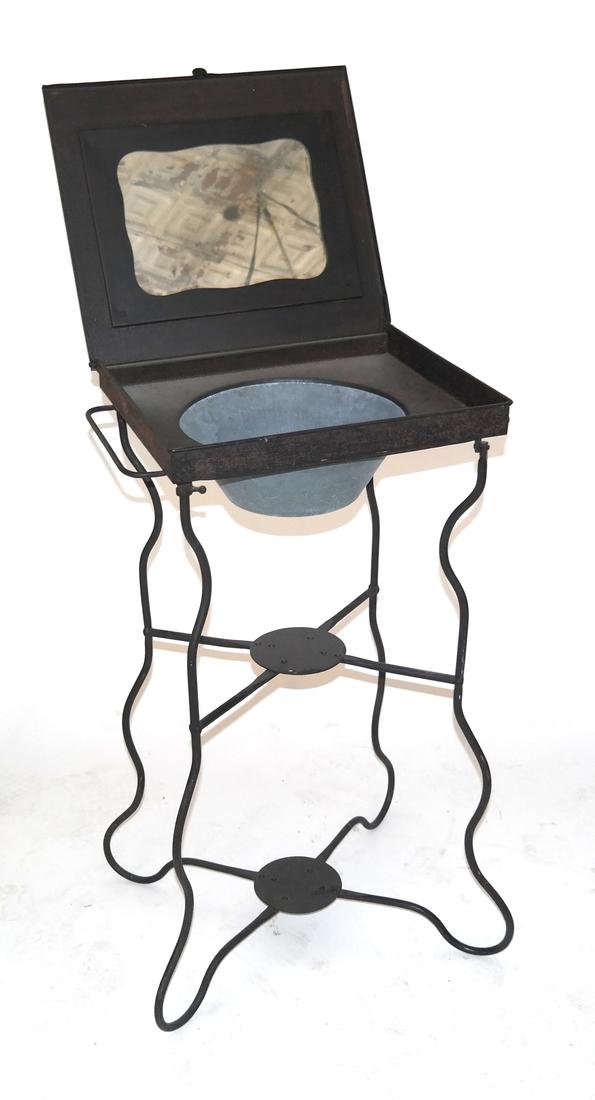 Black Aluminum Vanity Sink: Black vanity sink with a hinged top, inset mirror and a basin. [36 x 21 x 16 inches].