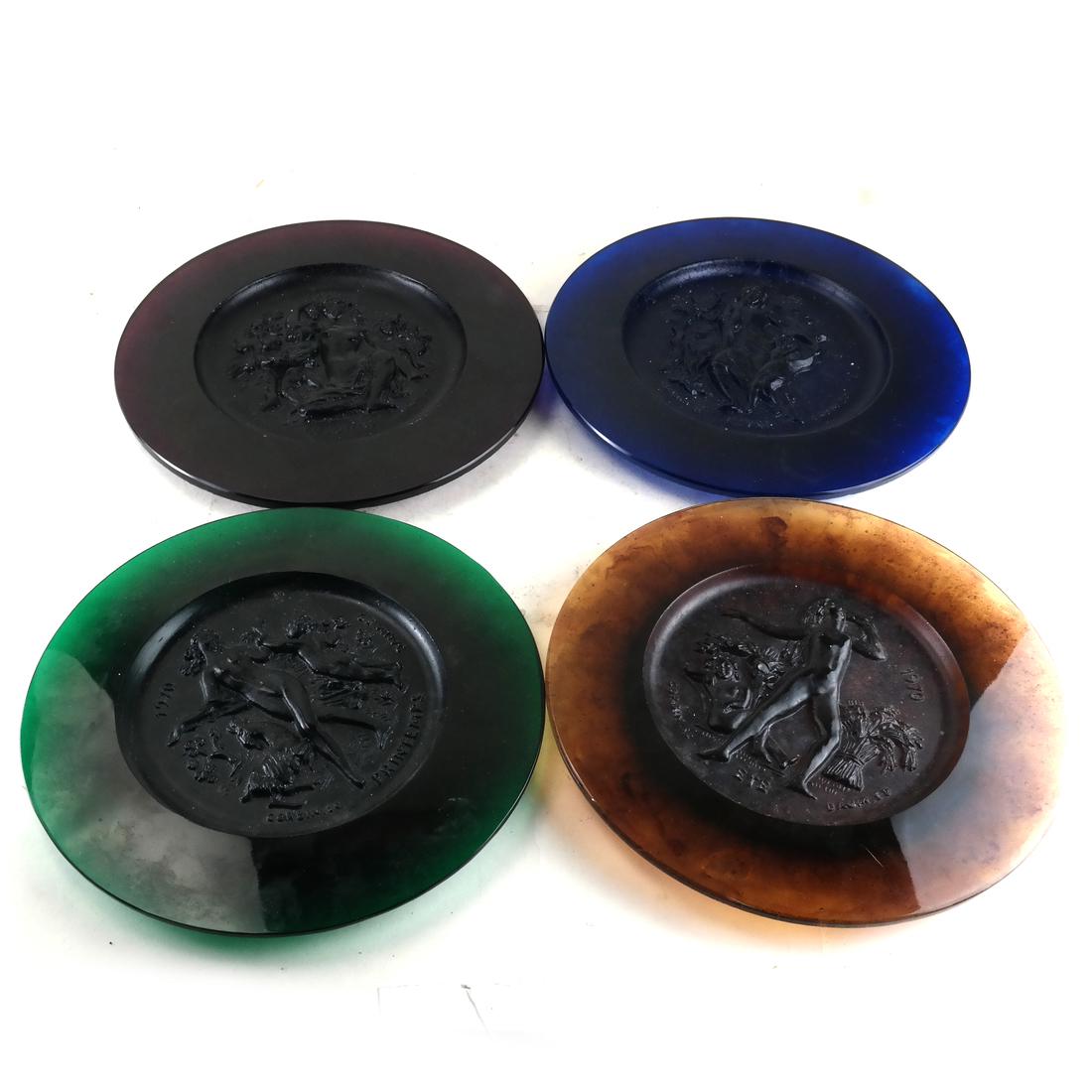Daum Nancy, Four Seasons Chargers: Set of four pate de verre multi-color relief chargers depicting the four seasons, by Daum Nancy - France. [Each: 10 1/2 (dia) inches].
