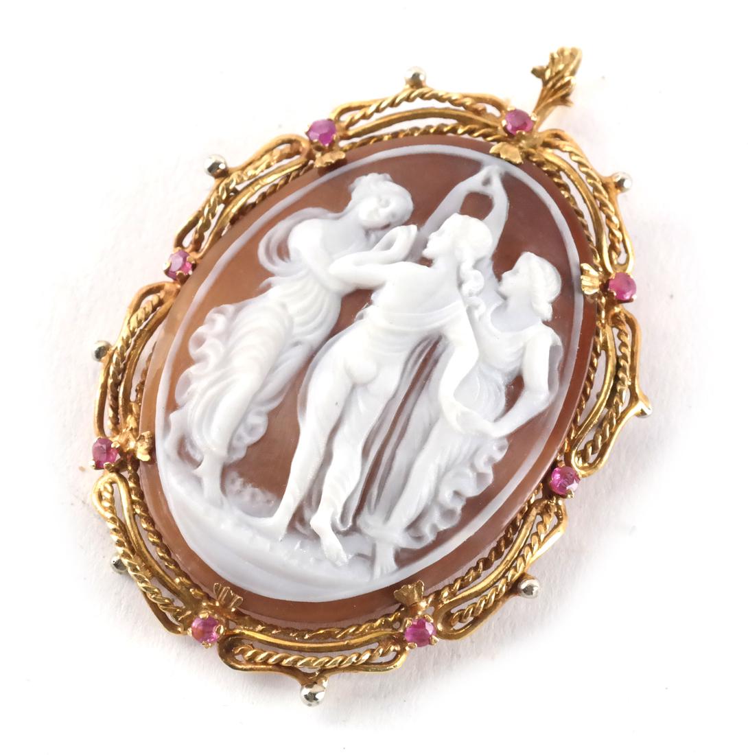 Antique 14k Italian Carved Cameo: 14k yellow gold Italian antique carved sardonyx cameo in mount, with 8 pink sapphires, 2 mm. [2 3/8 x 1 1/4 inches]. Weight .44 ozt.