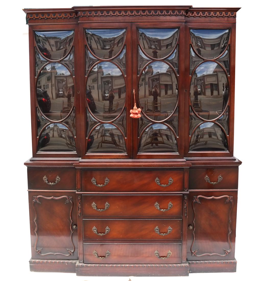 Georgian-Style Mahogany Breakfront: Two-part breakfront with a desk component, bubble design individual glass panels, and drawer. Possibly by Mahon, NY. [82 x 66 x 16 inches].