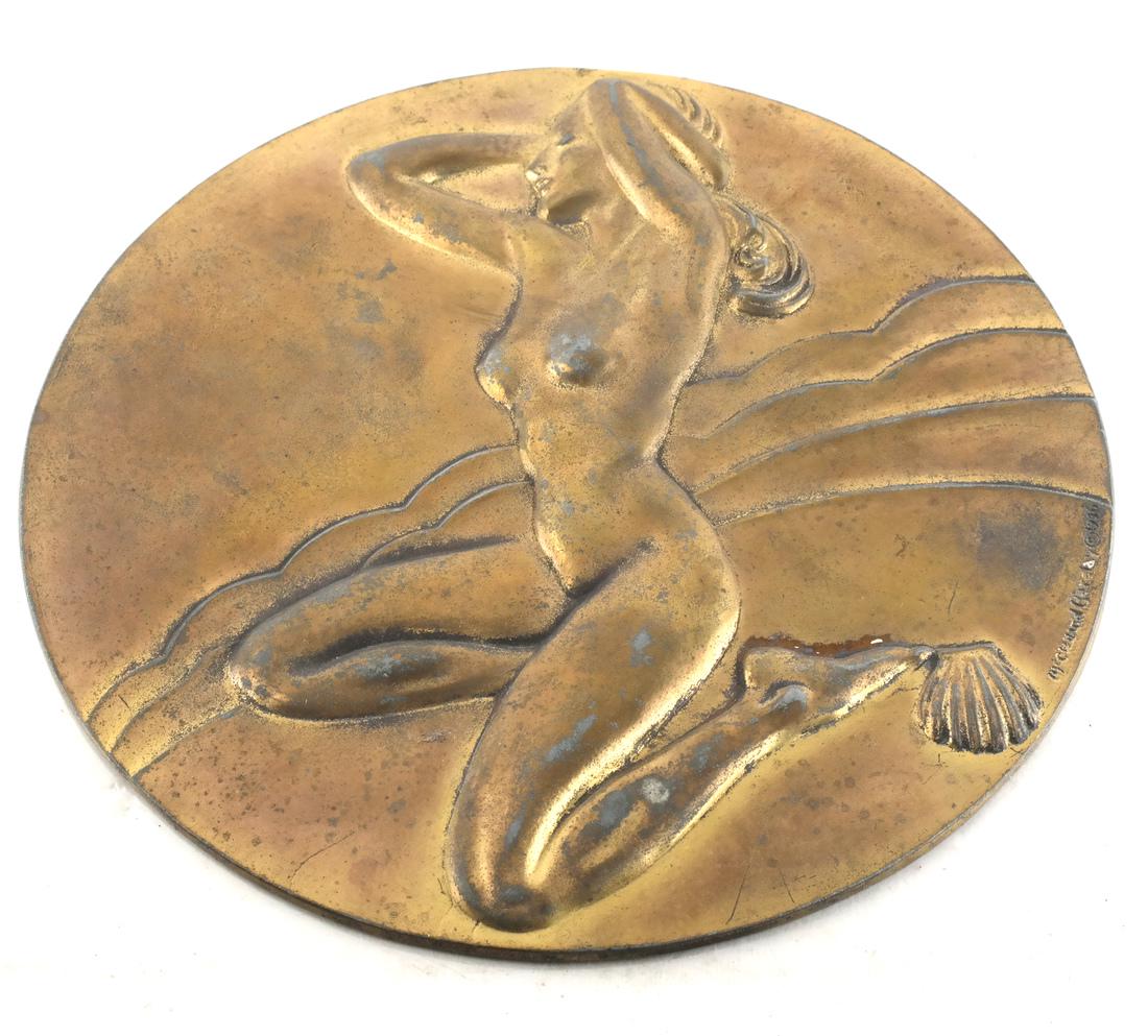 McClelland Barclay Sculpture - Relief Plaque: Vermeil plaque of a seated nude with sea shell, signed "McClelland Barclay 1936". [9 (dia) inches]. Wear and oxidation.