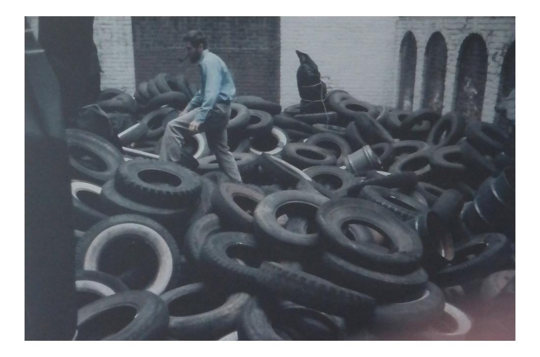Robert McElroy Photograph: Important photograph from the Happenings Movement in NYC, by Robert McElroy. Photo of Allan Kaprow exhibit The Yard. [Image: 8 1/2 x 12 7/8 inches; Frame: 14 x 18 inches].