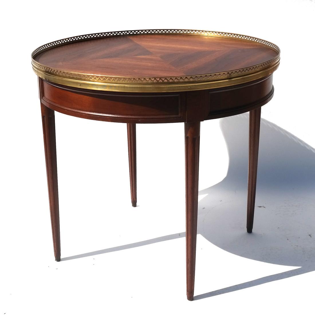 French Style Bouillotte Table: French style bouillotte table, with a reticulated brass gallery. [27 1//2 x 30 (dia) inches].