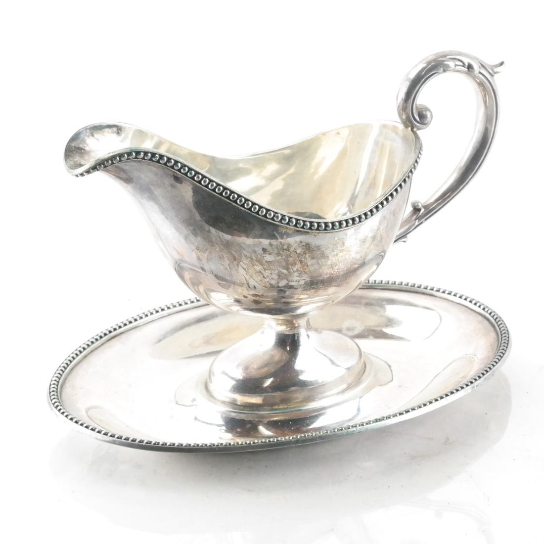 .800 Silver Gravy Boat, Mid 20th C.: .800 silver gravy boat, mid-20th c. [6 1/2 x 8 1/4 x 5 3/4 inches]. 14.715 ozt.