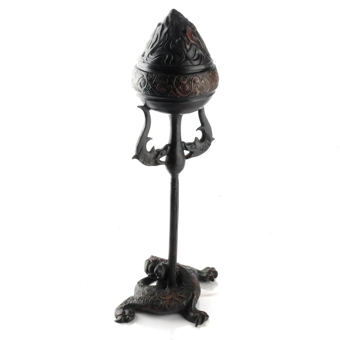 Chinese Bronze Incense Burner: Chinese bronze flamiform incense burner and a cover. [17 1/2 x 5 1/2 x 8 inches].