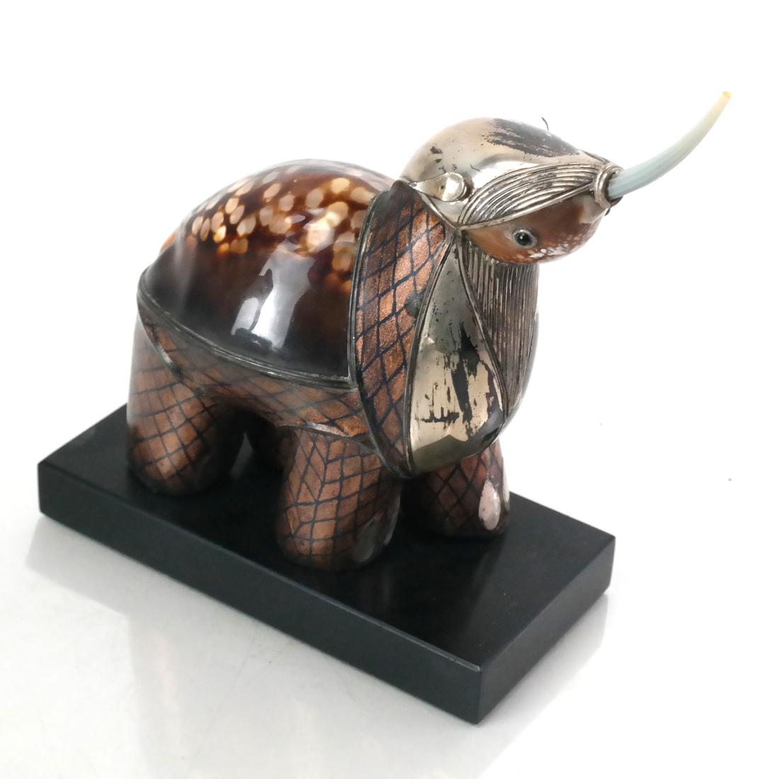 Roberto Estevez Rhino Sculpture: Robert Estevez Rhino sculpture, shell and silver, signed "Estevez". [4 1/2 x 3 3/4 x 2 inches]. Provenance: From the Dr. Richard and Odile Stern Collection.
