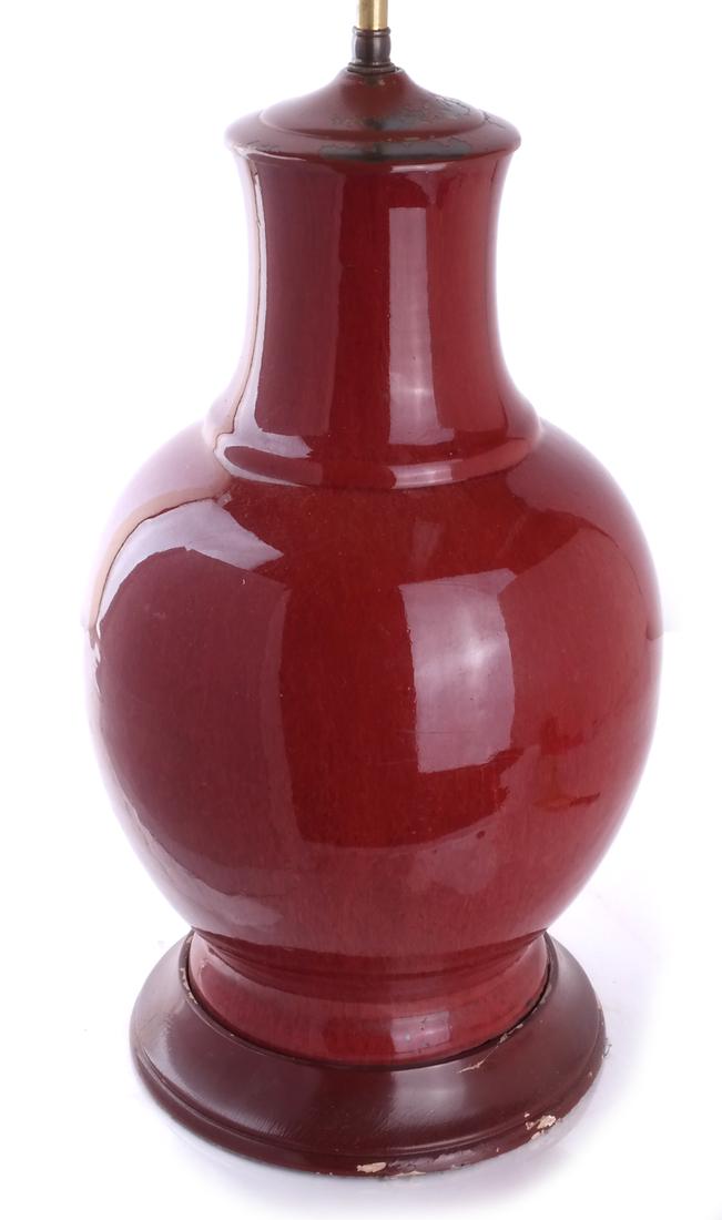 Sang de Boeuf Lamp: Oxblood vase, electrified, 19th/early 20th century. [Vase: 16 1/2 inches; Overall: 22 inches].