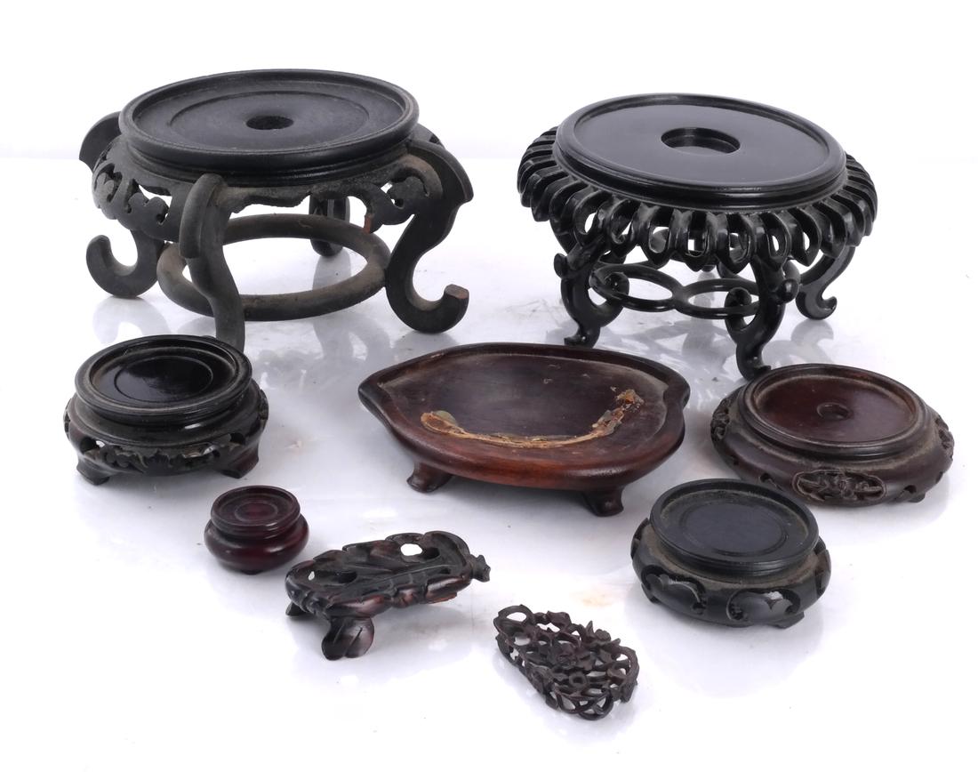 Group of Asian Bases/Stands: Group of Asian bases/stands. [Largest: 4 1/2 x 5 1/2 (dia) inches].