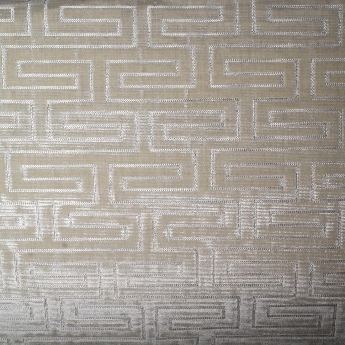 Bolt of FRET "Geofret" Figured Velvet: 29 1/2 yards of straw-colored viscose/cotton "Geofret" velvet from Fret Fabrics, #11-999. The geometric velvet is still in the original box. The 54" width upholstery fabric has a vertical repeat of 4 