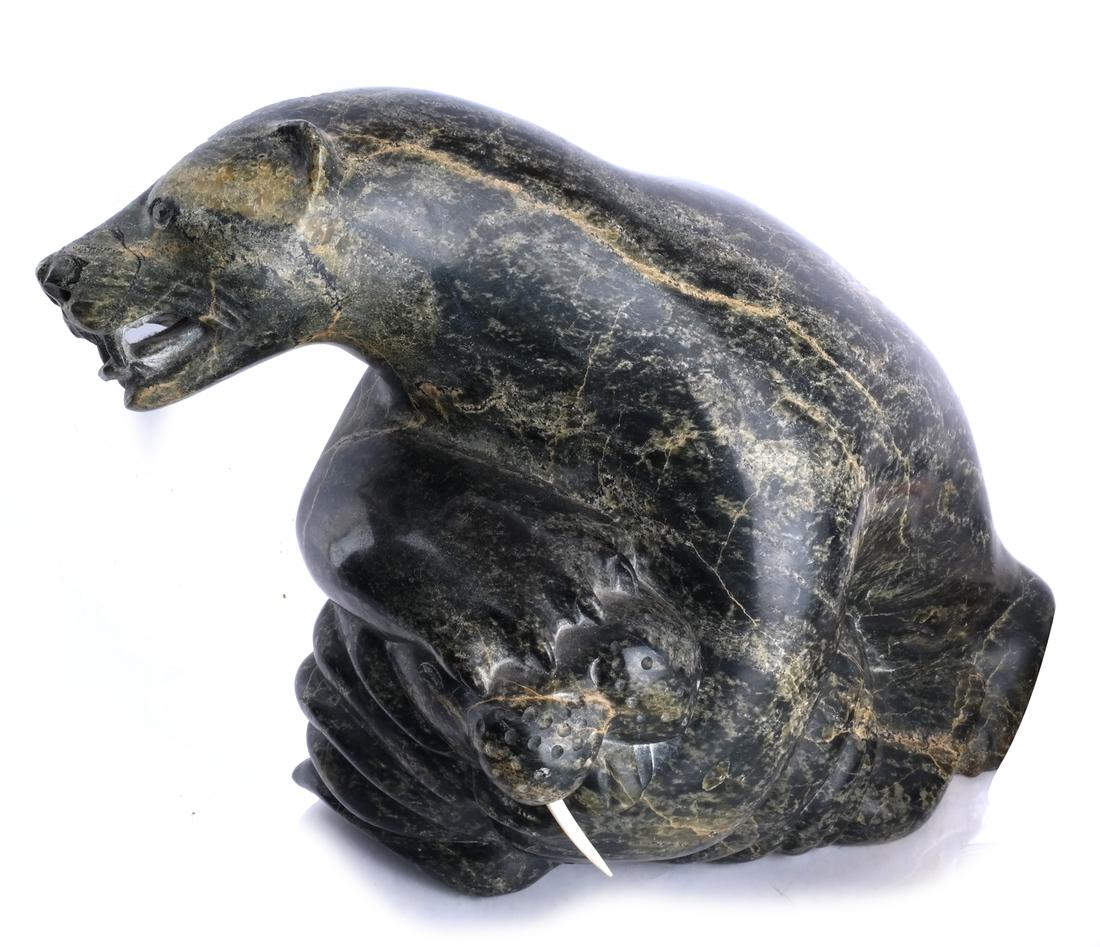 Inuit Bear with Walrus Stone Sculpture: Inuit stone sculpture, depicting a bear attacking a walrus. [12 x 7 x 11 inches]. Missing a tusk.