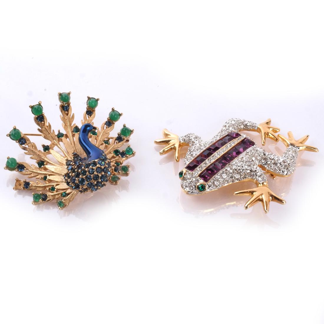 K.J.L. and Marcel Boucher Pins: A Kenneth Jay Lane pin and a Marcel Boucher pin: frog and peacock.