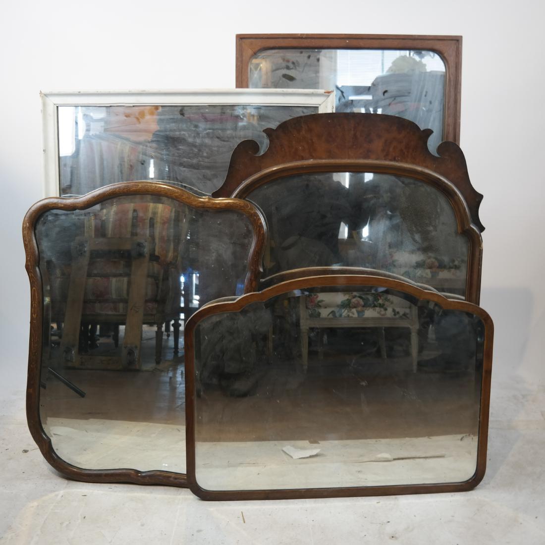 Five Antique Mirrors: Five antique mirrors. [36 1/2 x 26 inches; 39 1/2 x 28 1/2 inches; 44 x 22 inches; 24 x 28 inches; 22 x 28 inches]. All with wear.