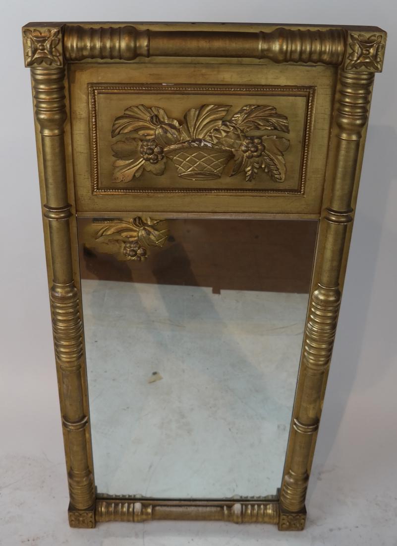 American Pier Mirror: American pier mirror, upper section with a basket relief. [46 x 22 1/2 x 2 1/2 inches]. In good condition.