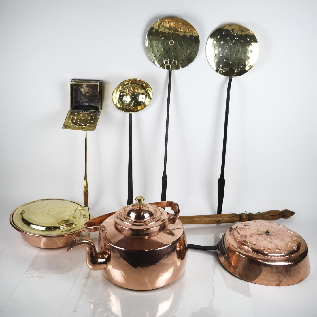 Lot of 7 Copper Kitchen & Household Articles: Copper lot includes: Bed-warming pan [41 inches long]; a long-handled copper pot adapted as a wall clock; 3 strainer spoons on long handles; a smaller square warming pan, and a large water kettle [9 1