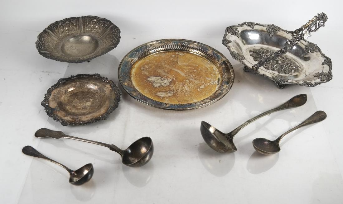 Lot of Silver Plate Articles: 1) A swing-handled oval basket [13 / 10 inches], 2) a footed bowl [9 1/4 (dia) inches, 3) plate (7 1/2 (dia) inches], 4) a round tray [12 1/2 (dia) inches], and 5) 4 large serving spoons [Largest: 13