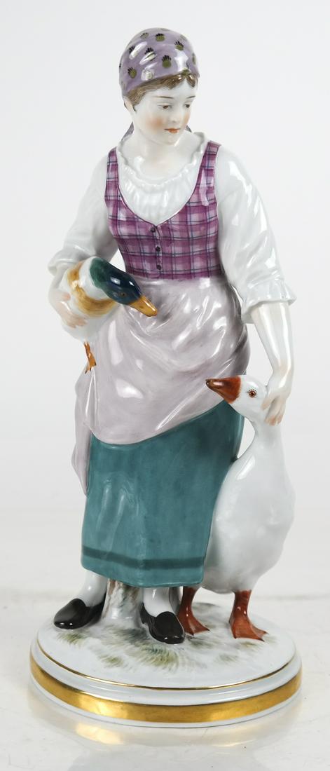 MEISSEN: Girl with Goose and Duck: Meissen porcelain figurine of a young girl with a goose, holding a duck. [10 inches high]. In good condition.