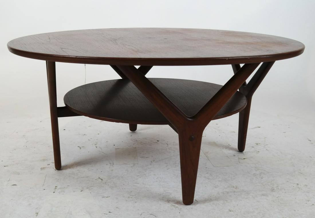 Arne VODDER & Anton BORG Coffee Table: Danish teak table by Vamo. [16 1/2 x 35 1/2 (dia) inches]. Light wear.