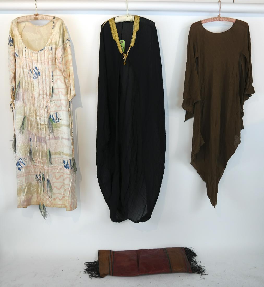 Cape, 2 Dresses and a Leather Pillow (1 of 14)
