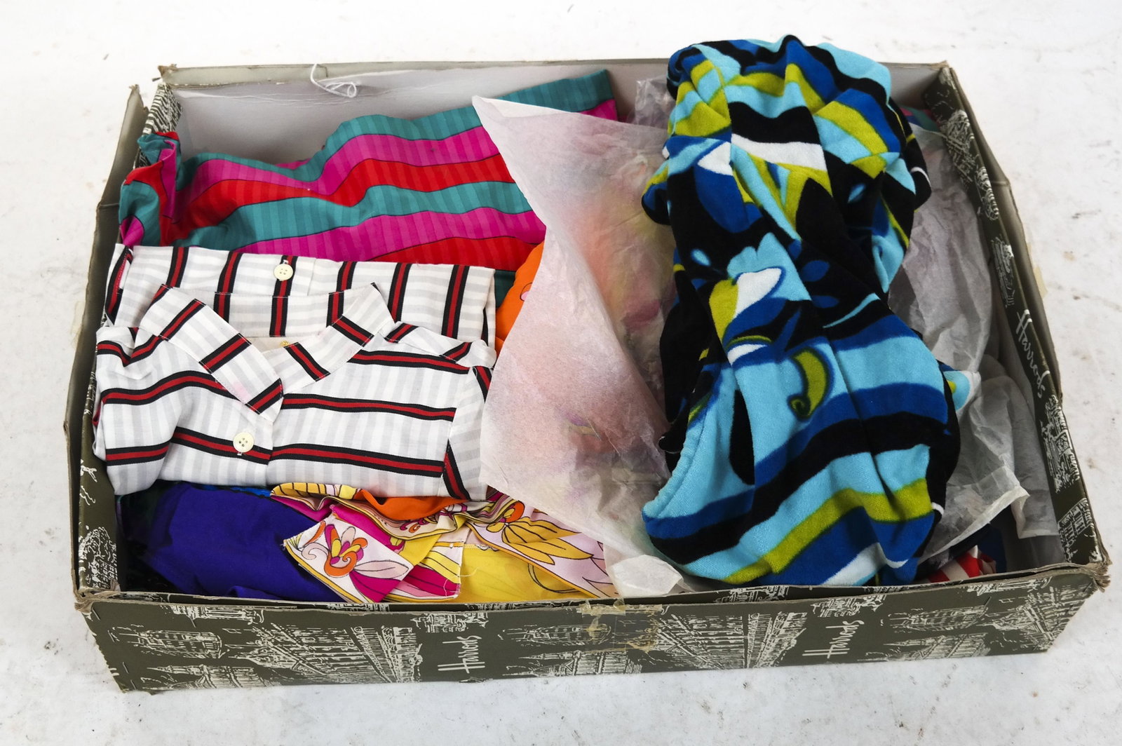 Lot Of Ladies Clothing: Lot of ladies clothing including summer shorts, bathing suits, some Pucci-style dresses, and more. In good used condition.