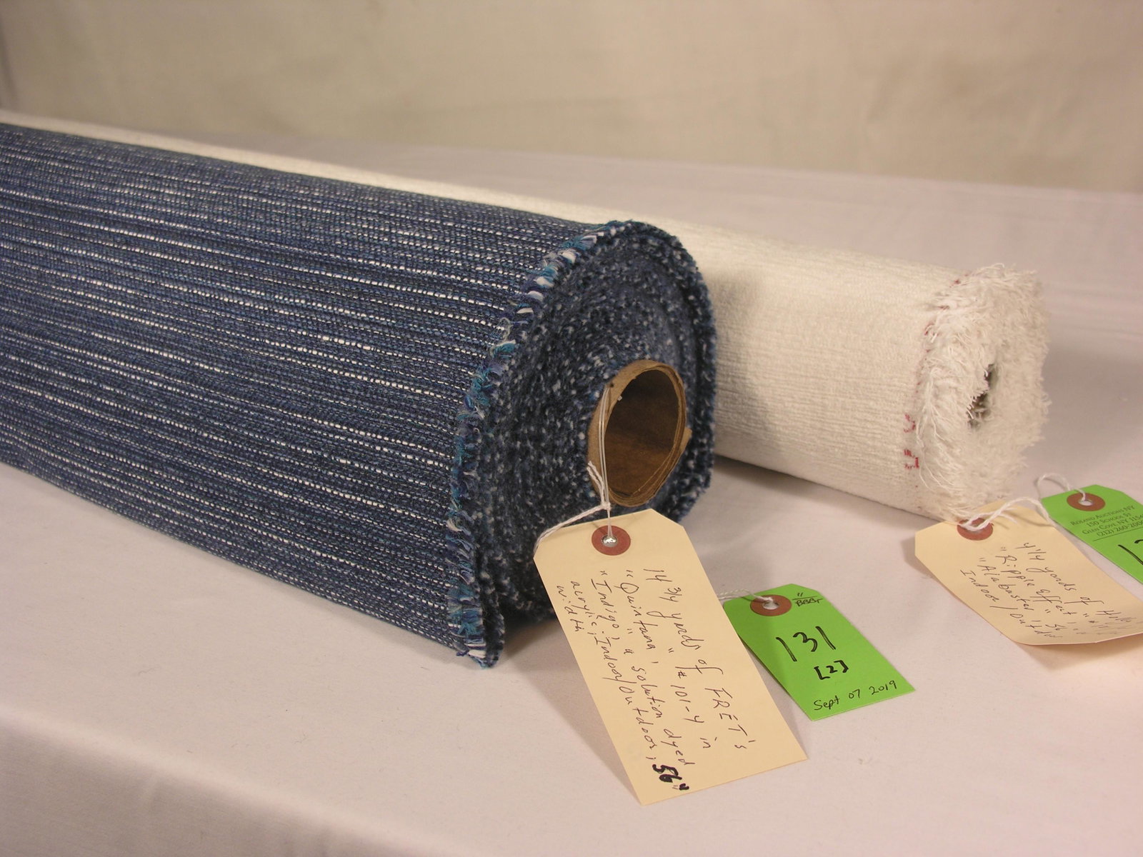 FRET & Holly Hunt Indoor/Outdoor Fabrics: 1) 14 3/4 yards of FRET Fabric's "Quintana", #101-4, a Sunbrella indoor/outdoor faux grass cloth in "Indigo". The 56" wide subtle horizontal fabric can also be railroaded for upholstery use. Color sim