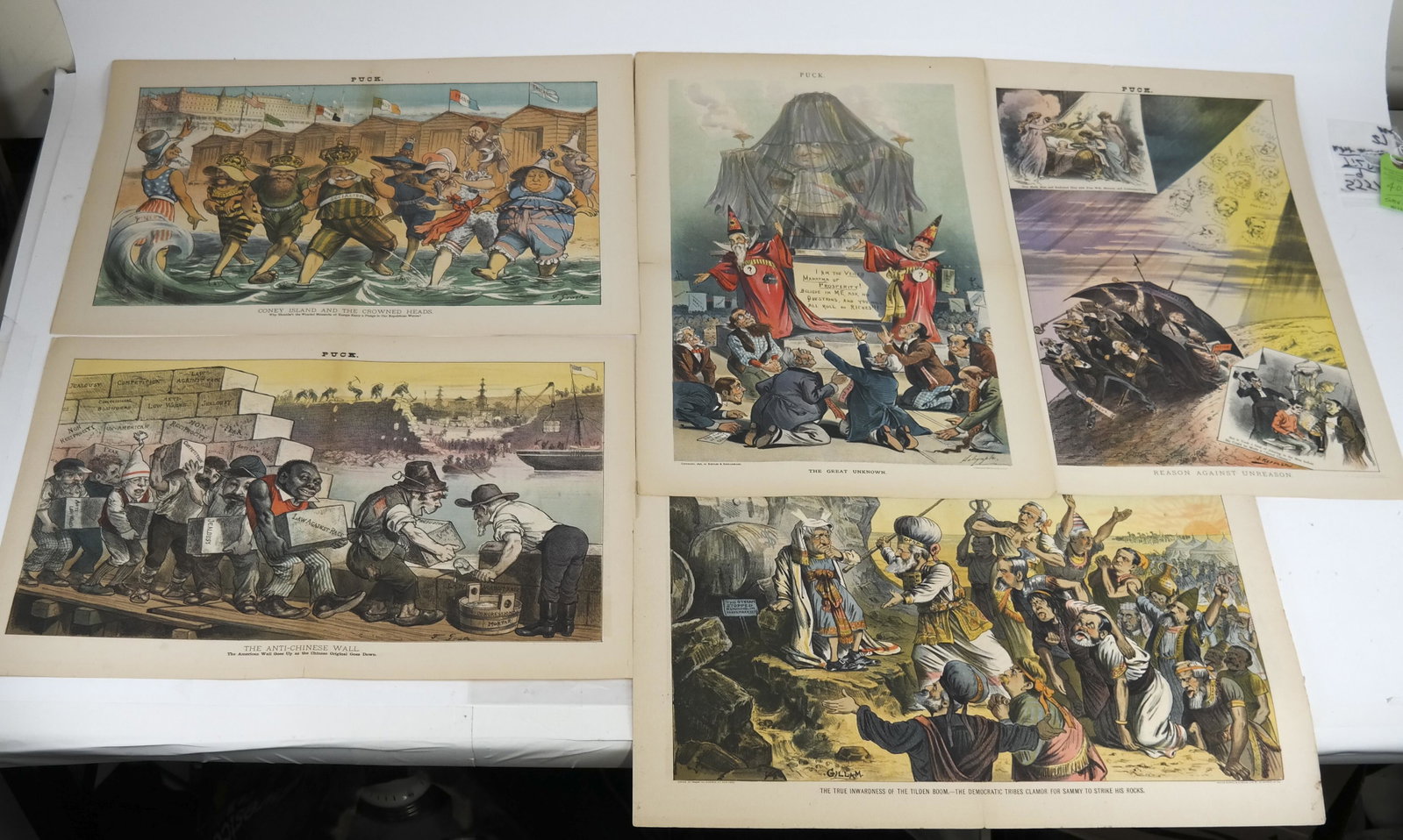 PUCK: Group of Political Cartoons: 1. Coney Island and the Crowned Heads; 2. The Anti-Chinese Wall; 3. Reason against unreason; 4. The true inwardness of the Tilden Boom - the Democratic tribes clamor for Sammy to strike his rocks; 5. 